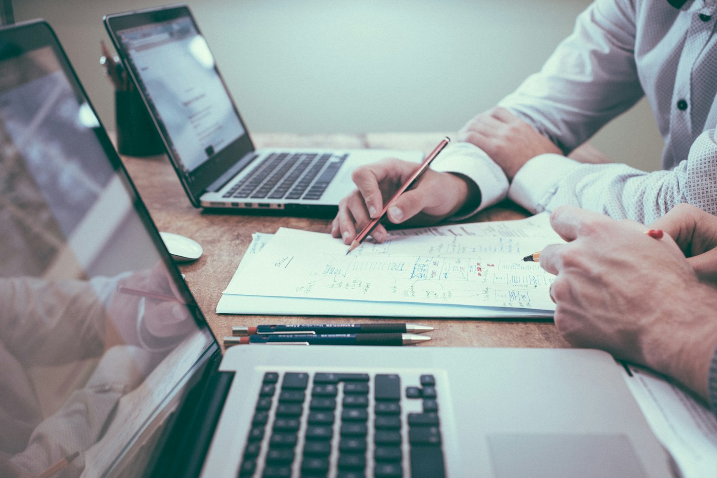 Business planning with documents and a laptop