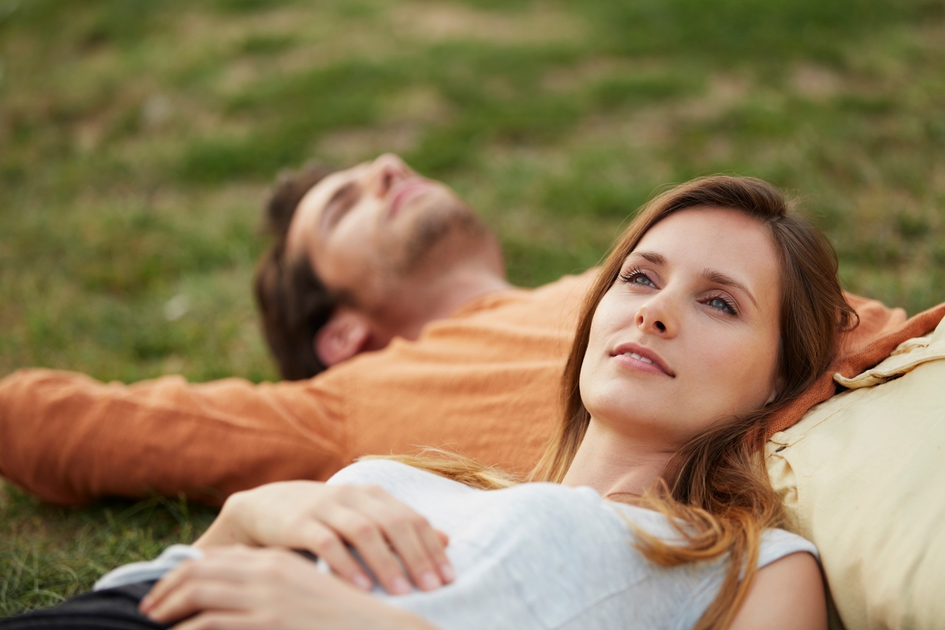 A couple relaxing together outdoors